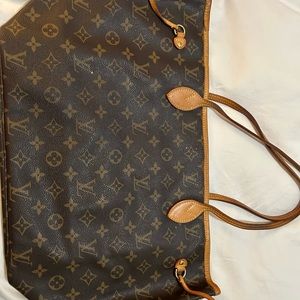 Authentic Louis Vuitton Never full tote.
